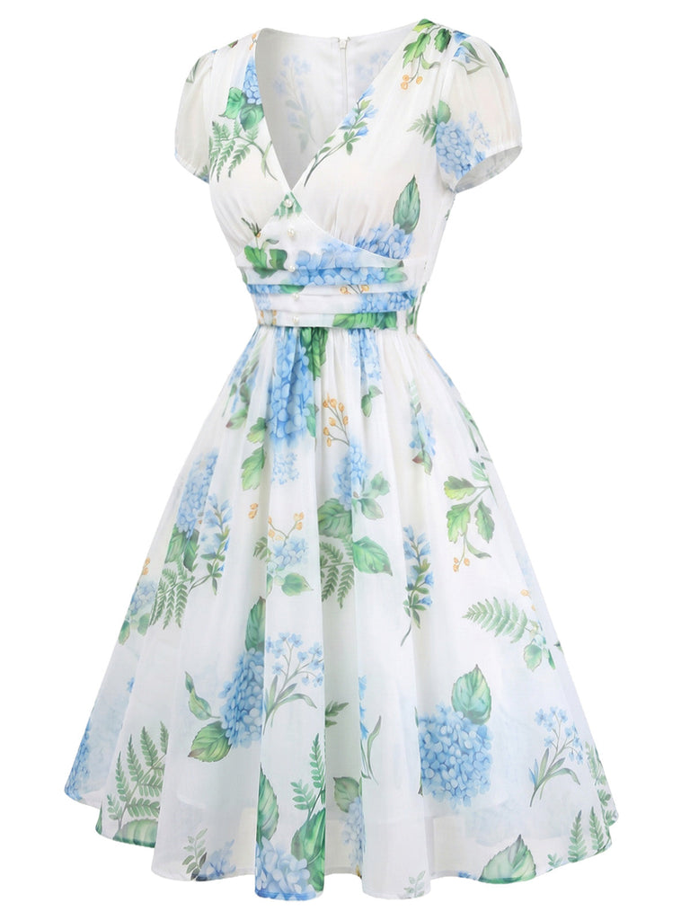 Blaues 50er Swingkleid mit Blumen-Print und V-Ausschnitt