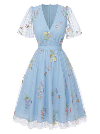 Blaues 50er Netz-Besticktes Kleid mit Puffärmel und Blumen