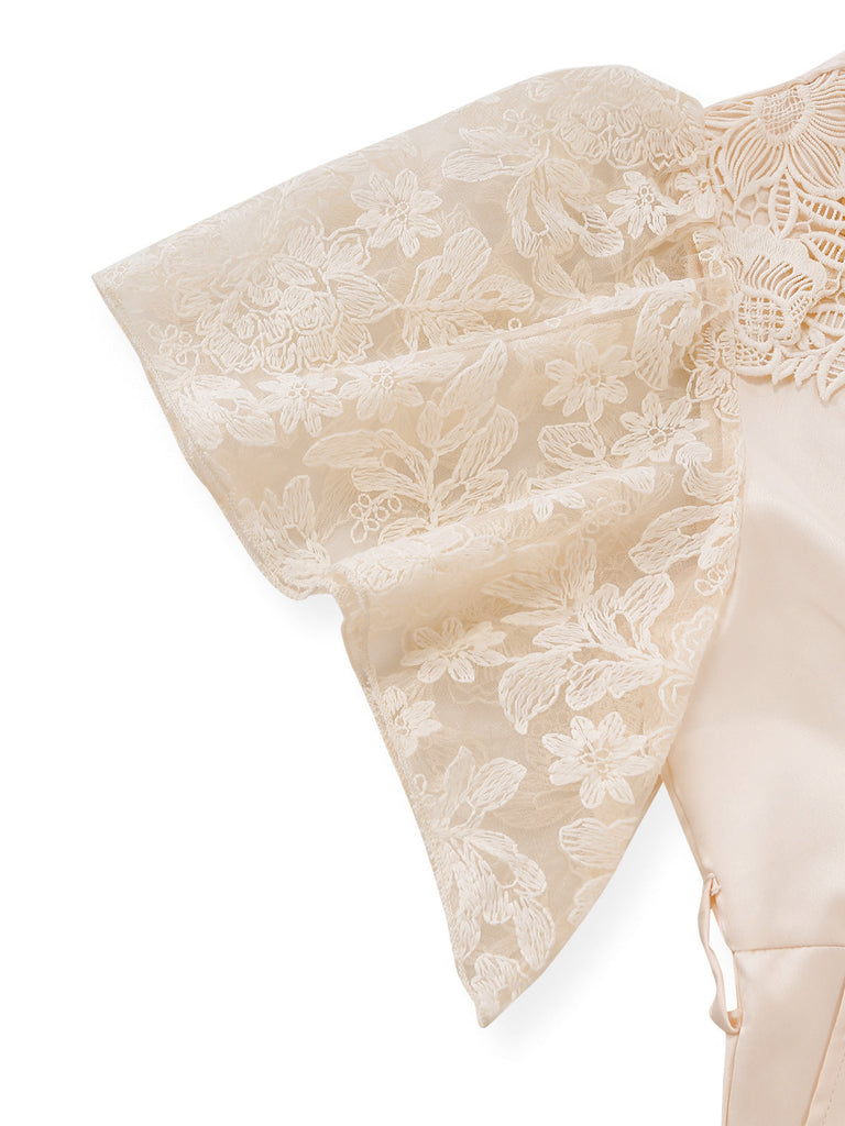 Aprikosenfarbener Jumpsuit im Stil der 1950er-Jahre mit floralem Spitzen-Satin-Schleifengürtel und Manschettendetail