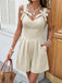 Beige 50er Romper mit Schleife und Plissee