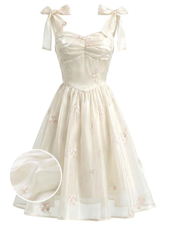 Beige 50er Korsett-Kleid mit Blumen und bestickt