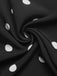 Schwarzer 50er Jumpsuit mit Polka-Dots und trägerlos
