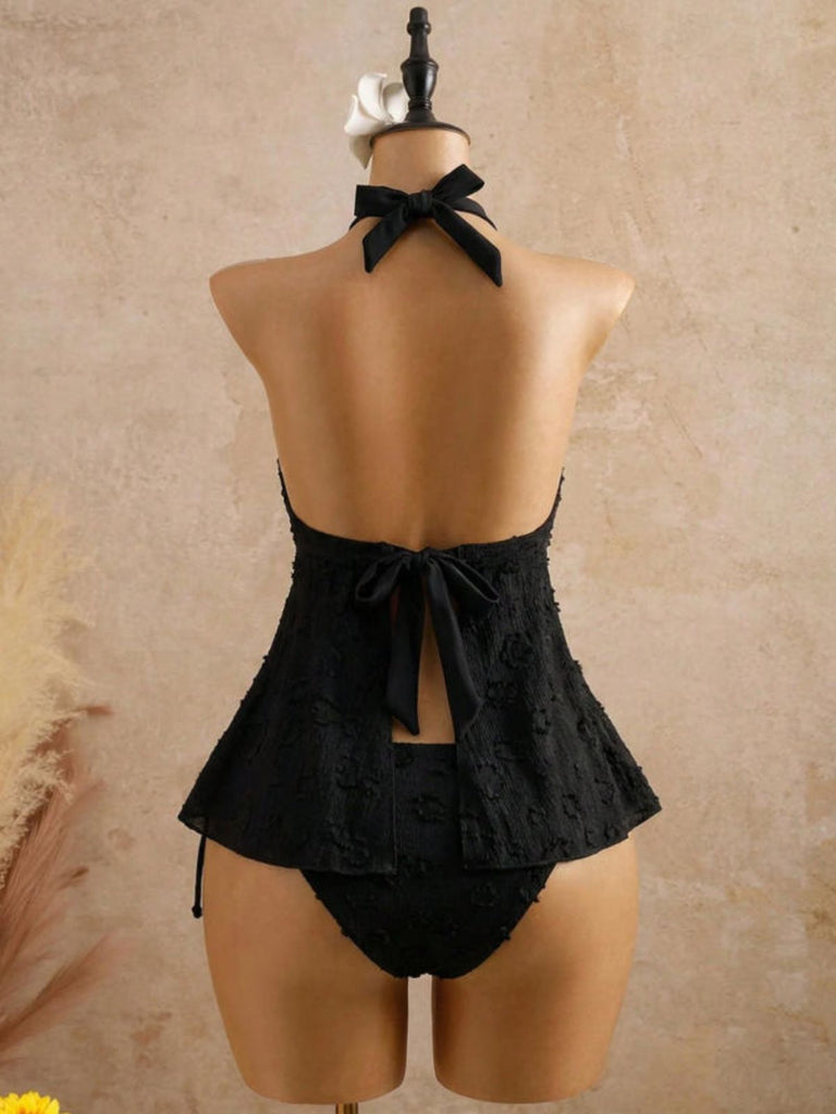 Schwarzes Tankini-Set im Stil der 1950er Jahre mit strukturiertem Blumenmuster und tiefem V-Ausschnitt, Rückansicht