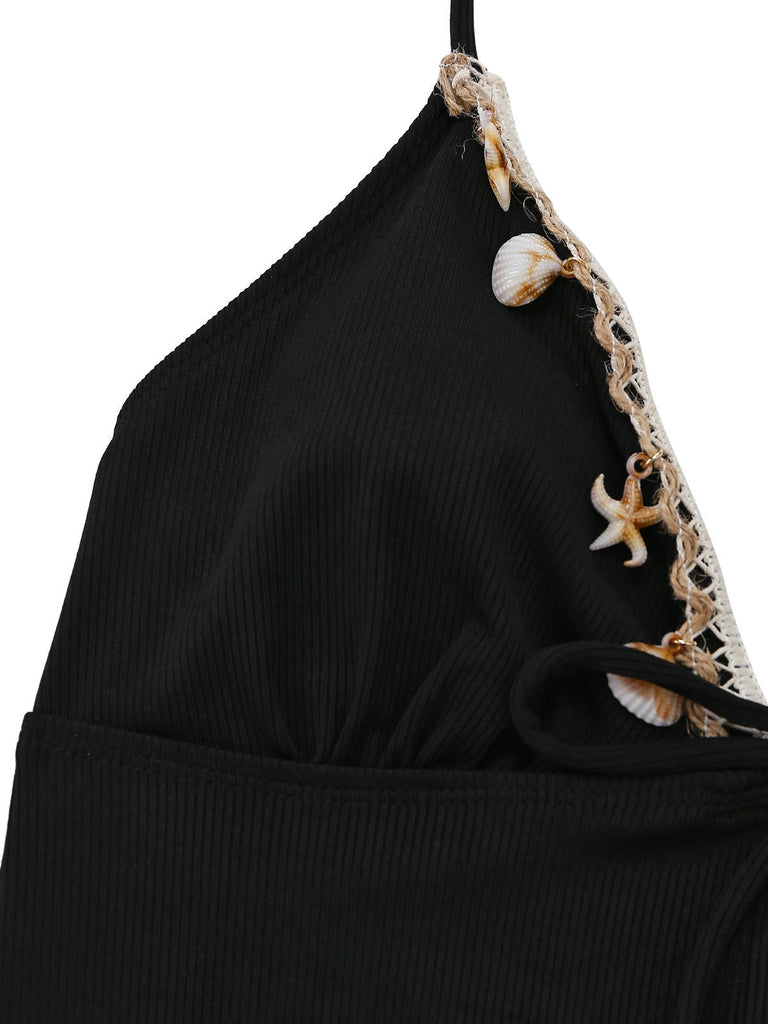 Schwarzes Neckholder-Top mit Muschel- und Spitzendetails auf weißem Hintergrund
