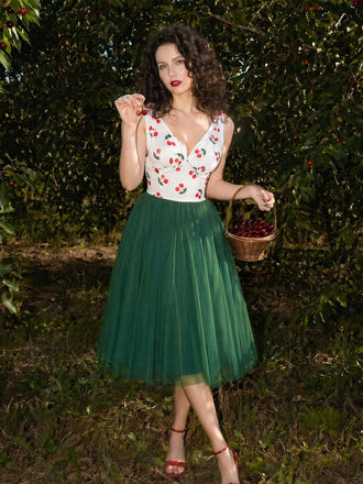 Dunkelgrünes 50er Netz-Kleid mit Farbblock und Kirschen