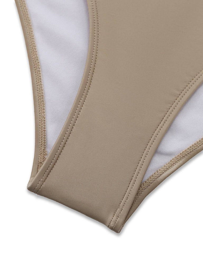 Neckholder-Badeanzug mit Cutout-Details im Zwickelbereich, der hochwertige Verarbeitung und bequeme Passform zum Schwimmen bietet.