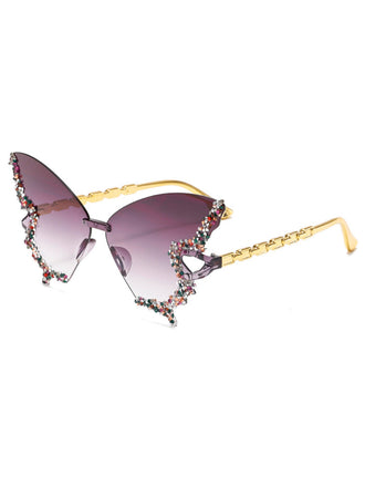 Sonnenbrille mit floralen Verzierungen auf weißem Hintergrund