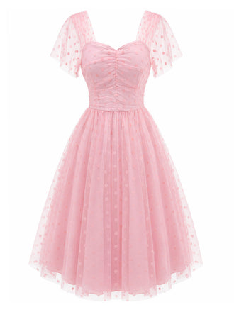Rosa 50er Netzkleid mit Herzausschnitt und Polka-Dots