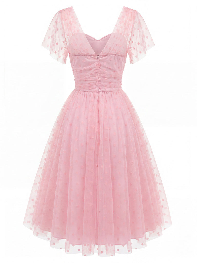 Rosa 50er Netzkleid mit Herzausschnitt und Polka-Dots