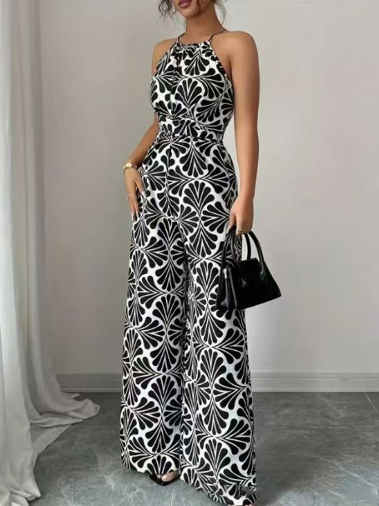 Schwarzer Jumpsuit mit Neckholder, abstraktem Muster und Gürtel im Stil der 1930er Jahre, Größe 4