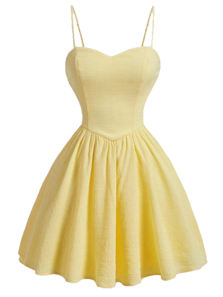 Gelbes 50er Swingkleid mit Spaghettiträger und Herzausschnitt