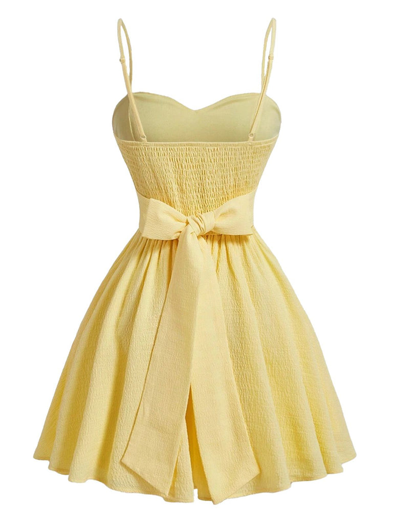 Gelbes 50er Swingkleid mit Spaghettiträger und Herzausschnitt