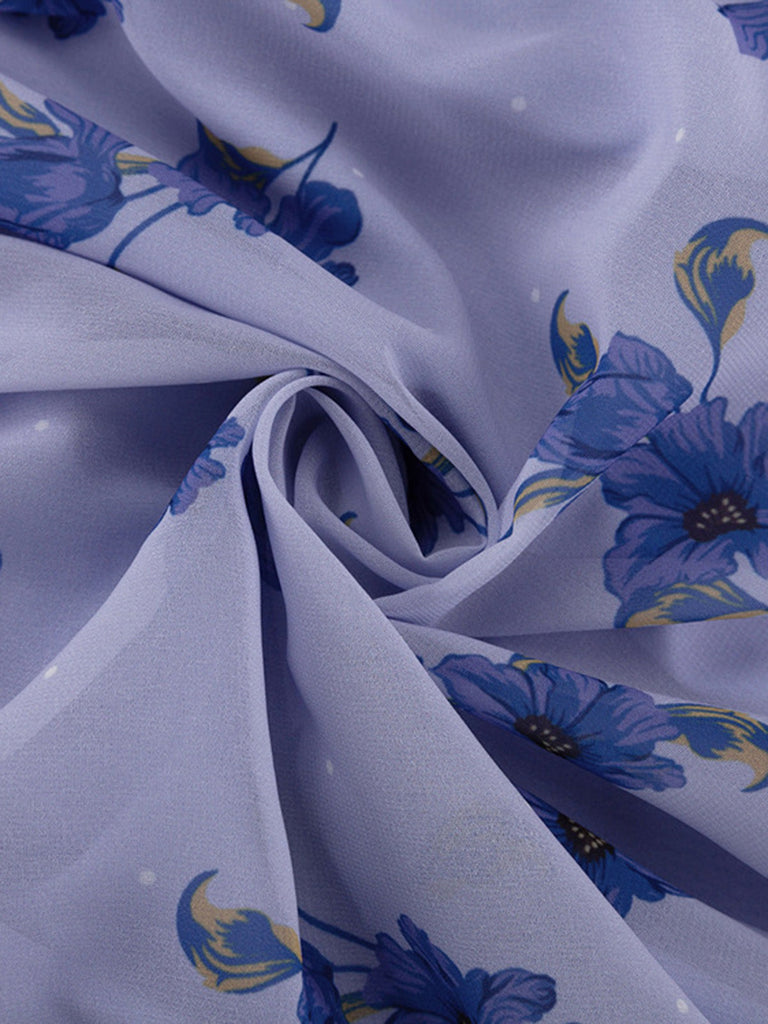 Blaues 50er Kleid mit Puffärmel und V-Ausschnitt