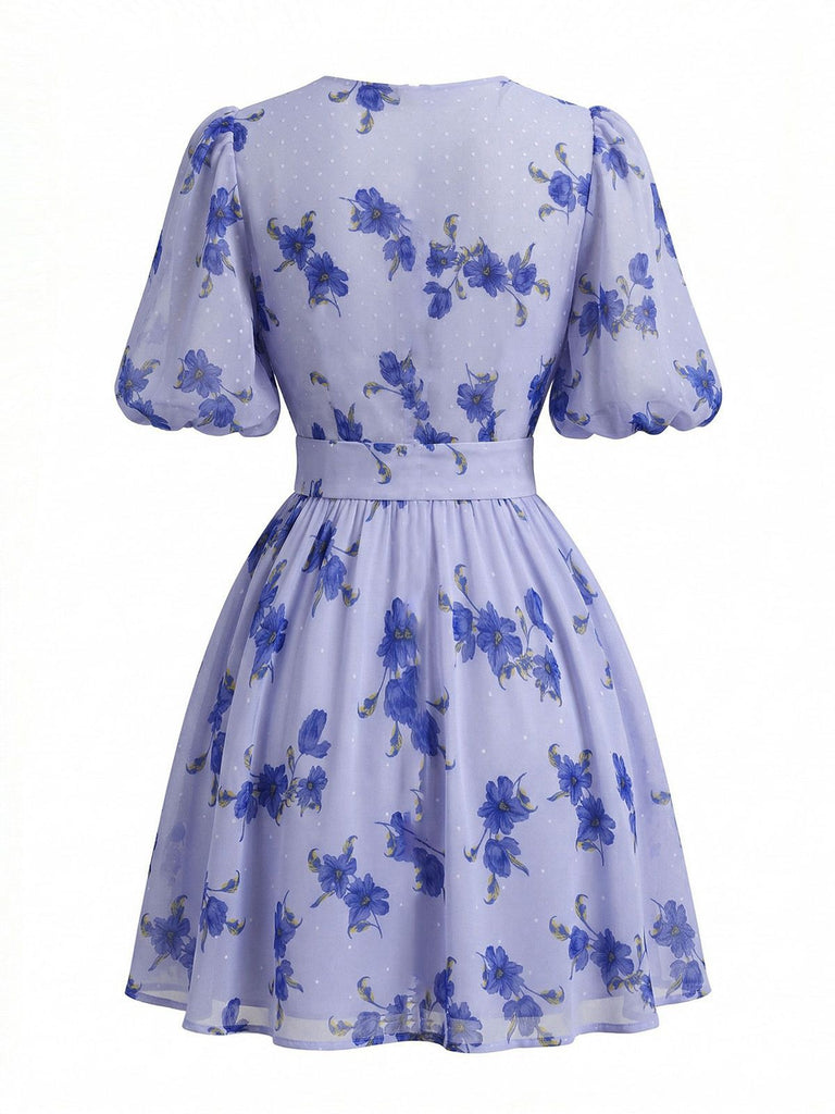 Blaues 50er Kleid mit Blumen und Puffärmeln
