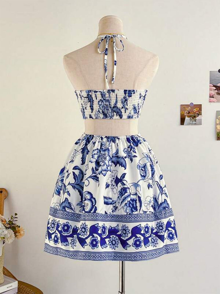 Kobaltblaues 50er Kleid mit Cut-Out und Blumen