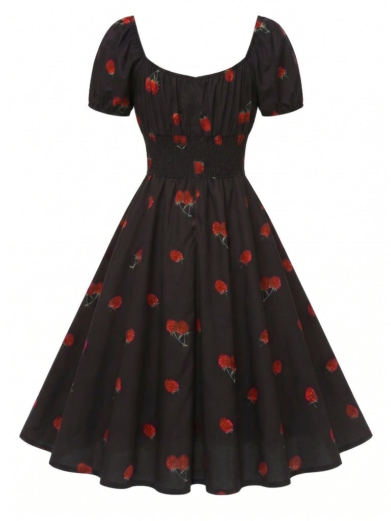 Schwarzes 50er Midikleid mit Himbeer-Print und Neckholder