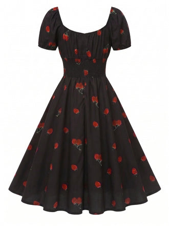 Schwarzes 50er Midikleid mit Himbeer-Print und Neckholder