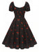 Schwarzes 50er Midikleid mit Himbeer-Print und Neckholder