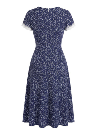 Dunkelblaues 40er Kleid mit V-Ausschnitt und Blumen