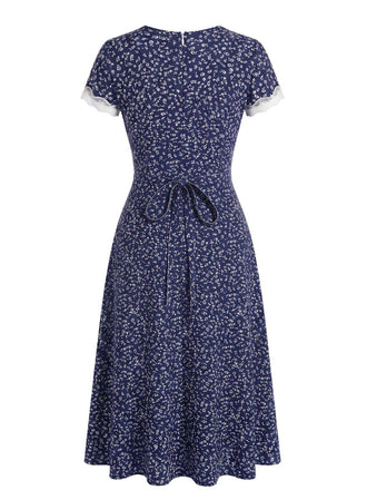 Dunkelblaues 40er Kleid mit V-Ausschnitt und Blumen