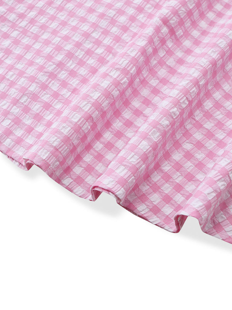 Rosa 50er Kleid mit Gingham und Puffärmeln