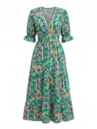 Grünes 70er Smock-Maxikleid mit abstraktem Blumen-Print und V-Ausschnitt