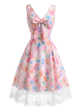 Mehrfarbiges 50er Kleid mit Blumen und Schleife