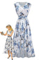 Weißes 50er Kleid mit Blumenmuster und High-Low-Saum