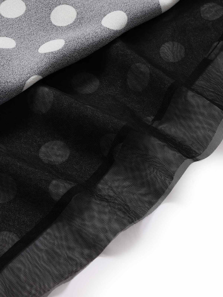 Schwarzes 50er Strick-Swingkleid mit Kappärmel und Polka-Dots