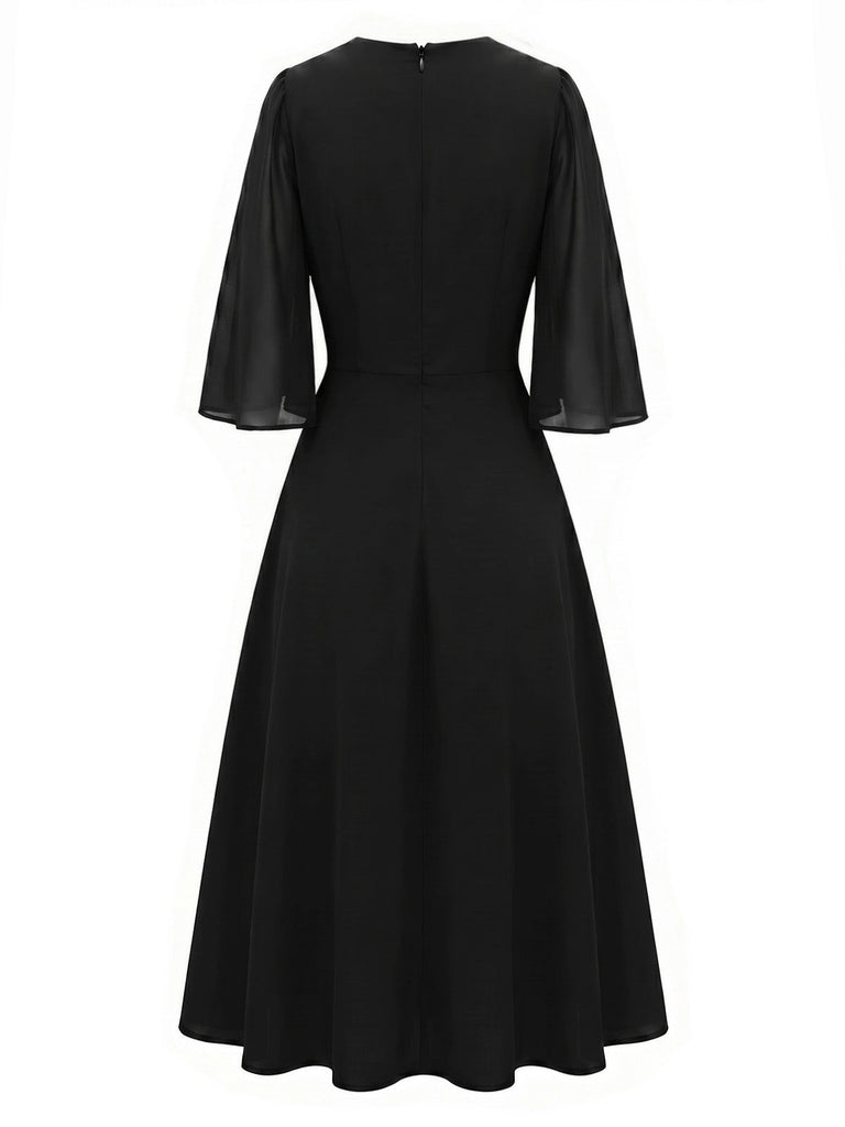 Schwarzes 40er Kleid mit Strass