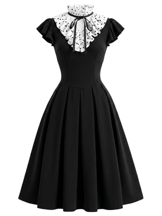 Schwarzes 50er Kleid mit Polka-Dots und Rüschen