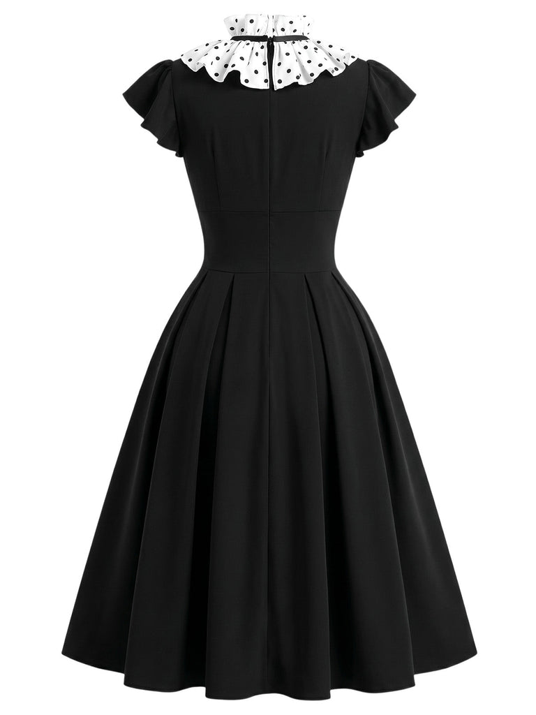 Schwarzes 50er Kleid mit Polka-Dots und Rüschen
