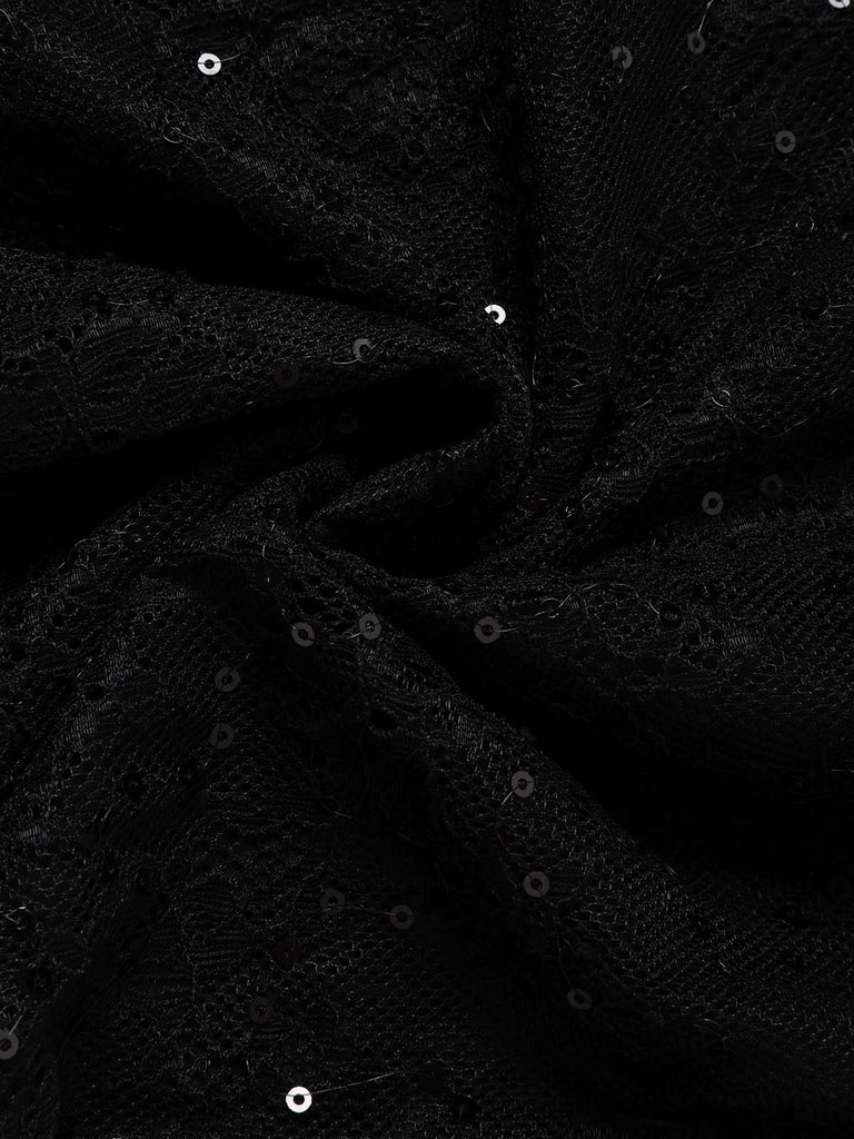 Schwarzer 60er Jumpsuit mit Herzausschnitt und Pailletten