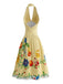 Gelbes 50er Kleid mit Neckholder und Blumen