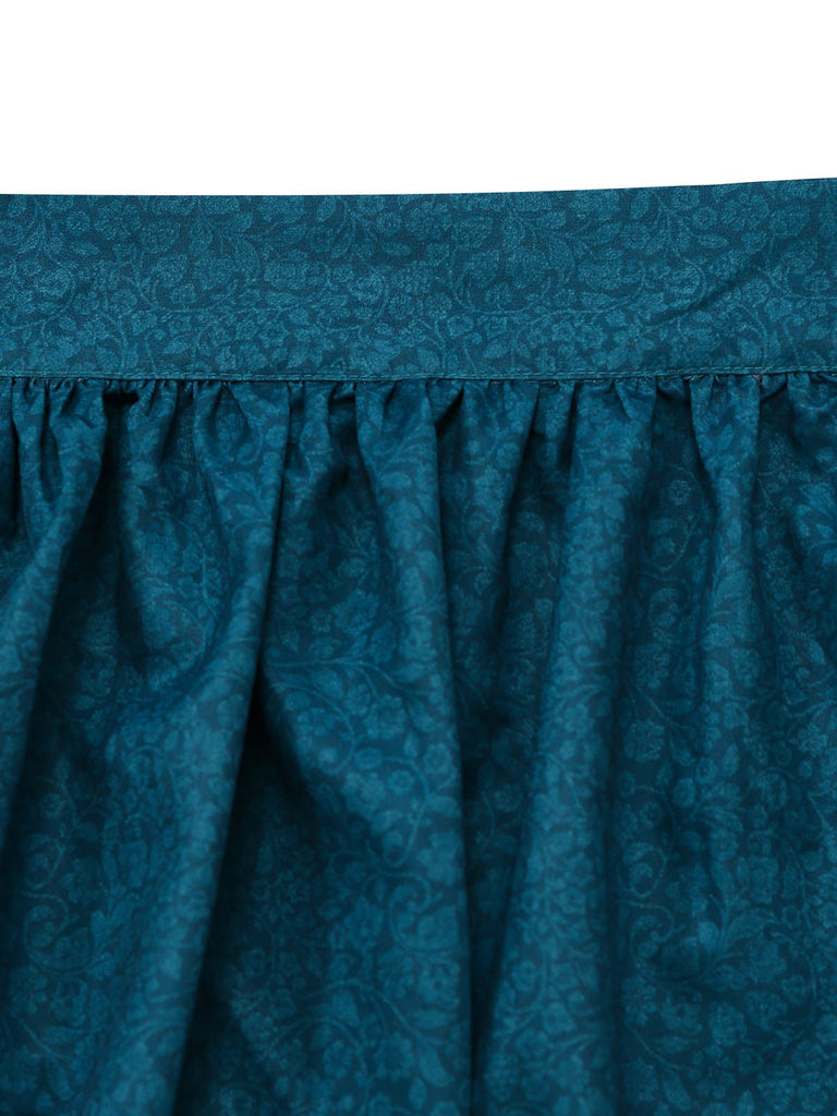 Blaugrünes 3-teiliges 50er Kleid mit Blumen-Schürze und Spitzentop