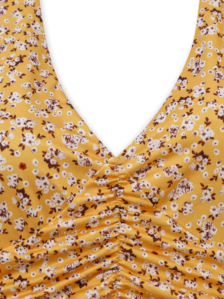 Gelbes 50er Kleid mit Streublumen und Neckholder