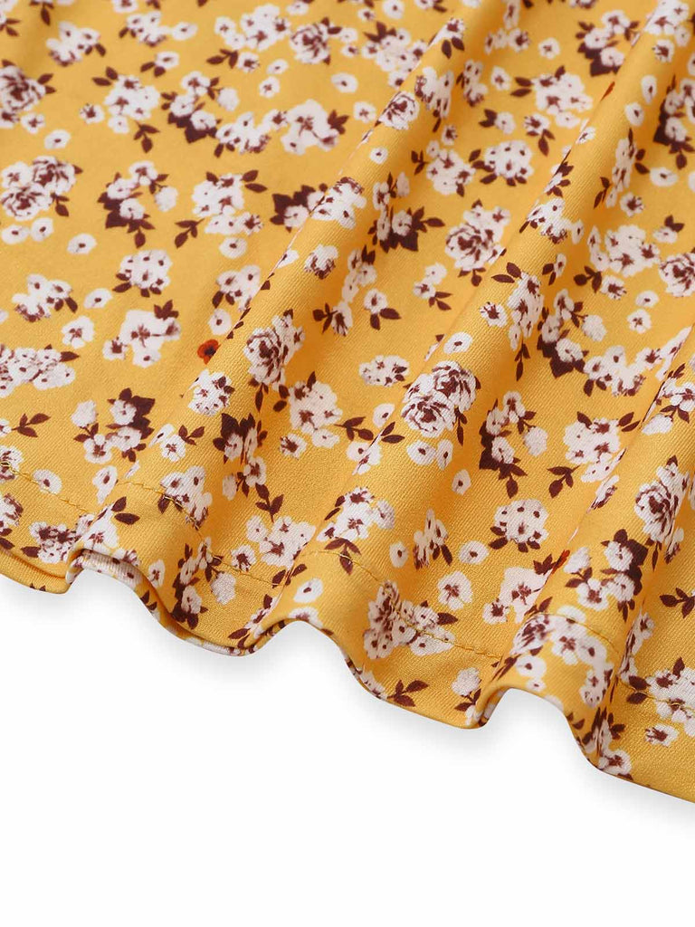Gelbes 50er Kleid mit Streublumen und Neckholder