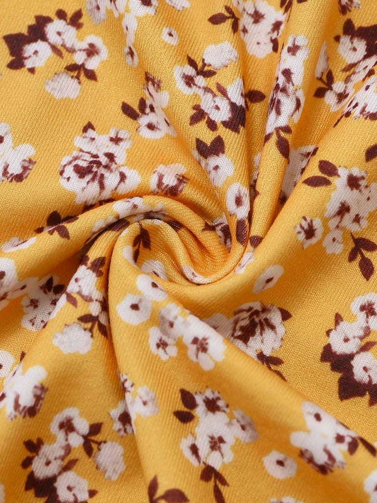 Gelbes 50er Kleid mit Streublumen und Neckholder