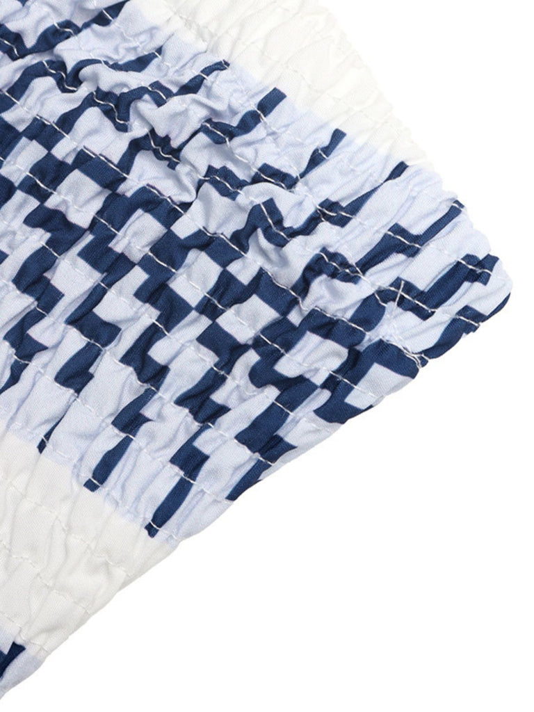 Blauer 70er trägerloser Jumpsuit mit geometrischem Print