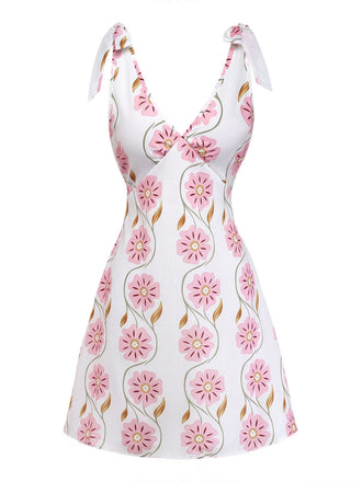 Rosa 60er Kleid mit Spaghettiträger und Blumen