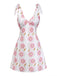 Rosa 60er Kleid mit Spaghettiträger und Blumen