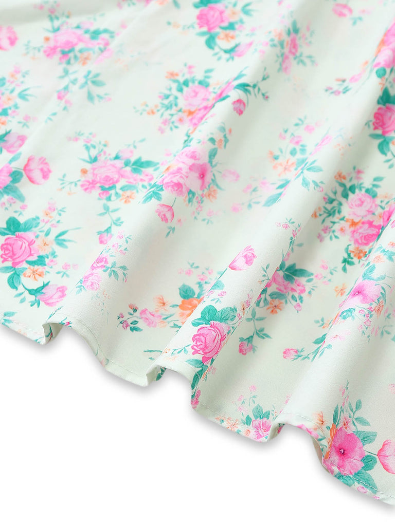 Grünes 50er Kleid mit Streublumen und Puffärmel