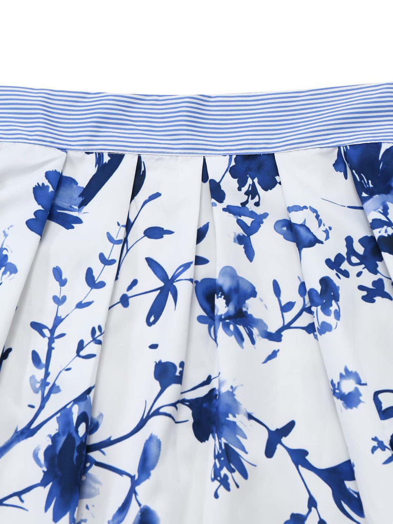 Blaues 50er 2PCS Kleid mit Blumen-Schürze