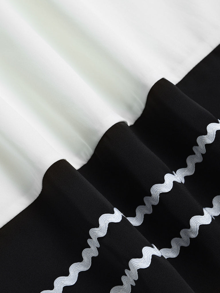 Schwarz-Weisses 50er Kleid mit Carmen-Ausschnitt