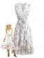 Weißes 70er Kleid mit Geo-Print und High-Low-Saum