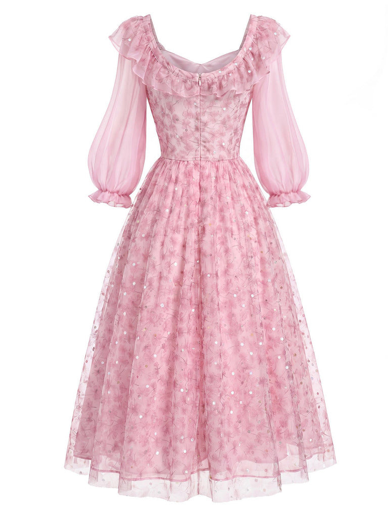 Rosa 50er Netzkleid mit Rüschen und Blumen