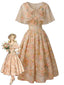 [Vorverkauf] Orange 50er Blumenkleid mit Cape-Kragen und Gürtel