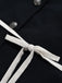 Dunkelblauer 60er Blazer mit Kontrastrevers und Gürtel