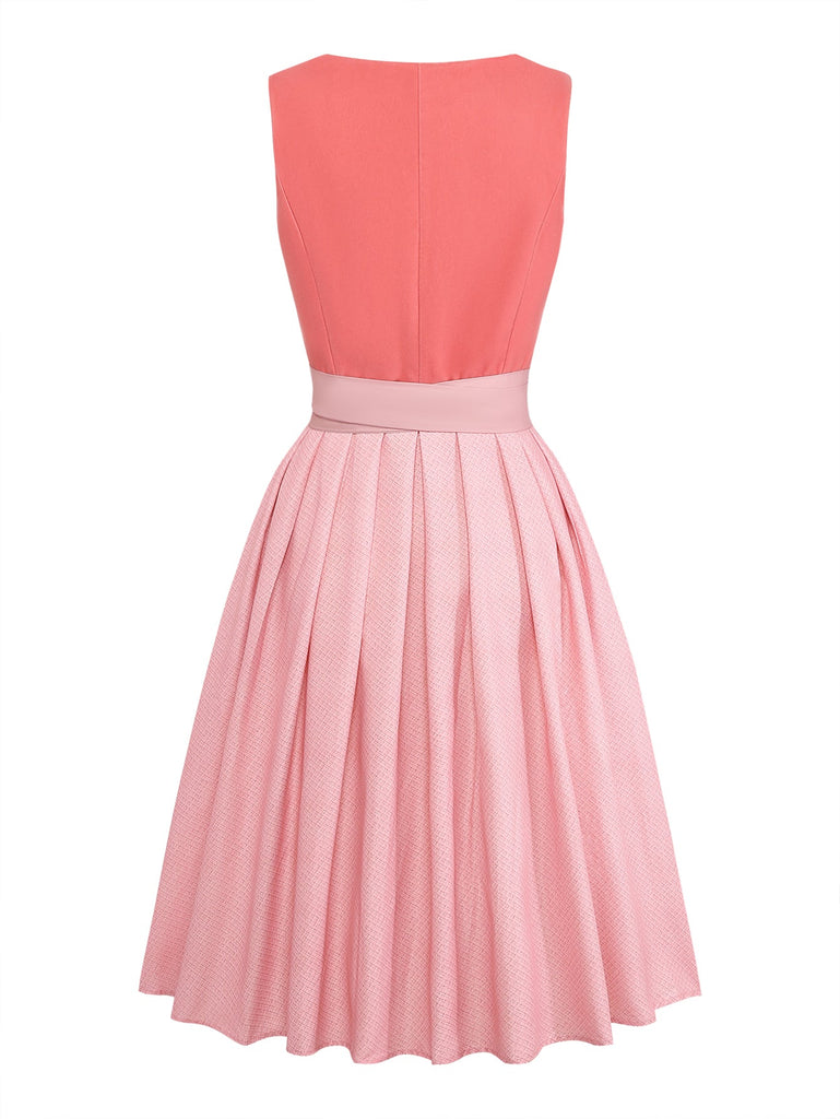 Rosa 50er Kleid mit Schürze und Herzausschnitt