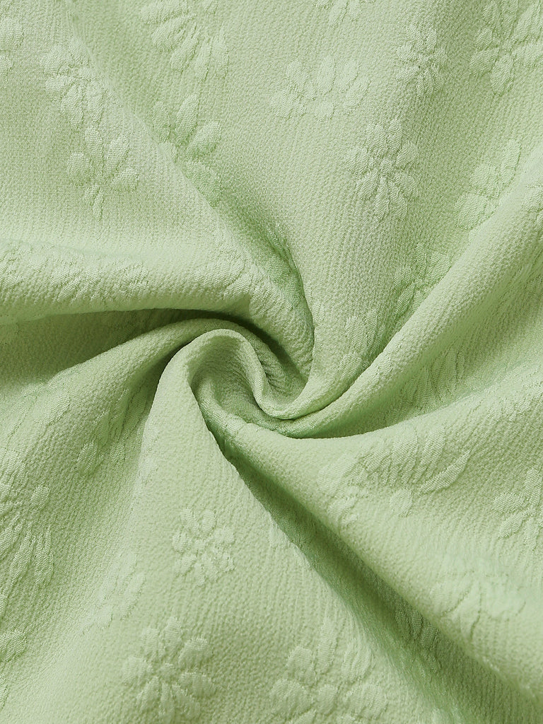 Grüner 50er Jacquard-Jumpsuit mit Spaghettiträger und Schleife